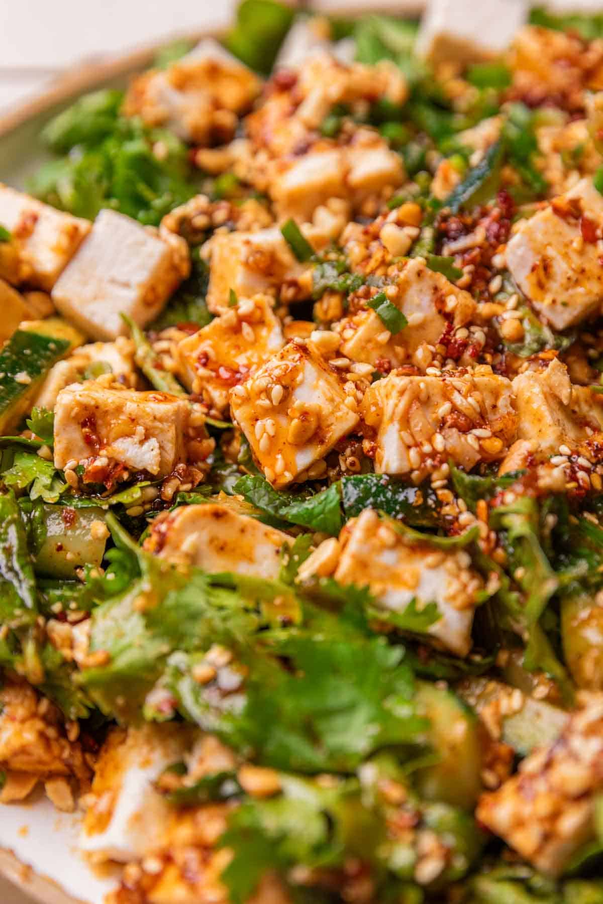A close up image of Asian cucumber salad to show it's texture