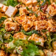 A close up image of Asian cucumber salad to show it's texture