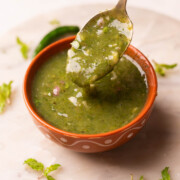 a little himachali mahni scooped up in a spoon to show it's thick texture