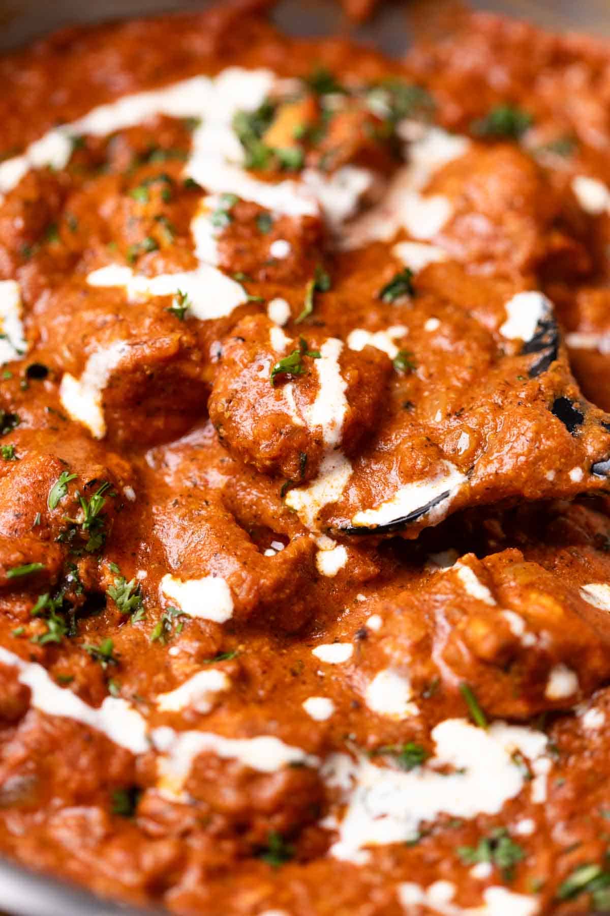 a close image up of 30 minutes butter chicken to show its creamy texture