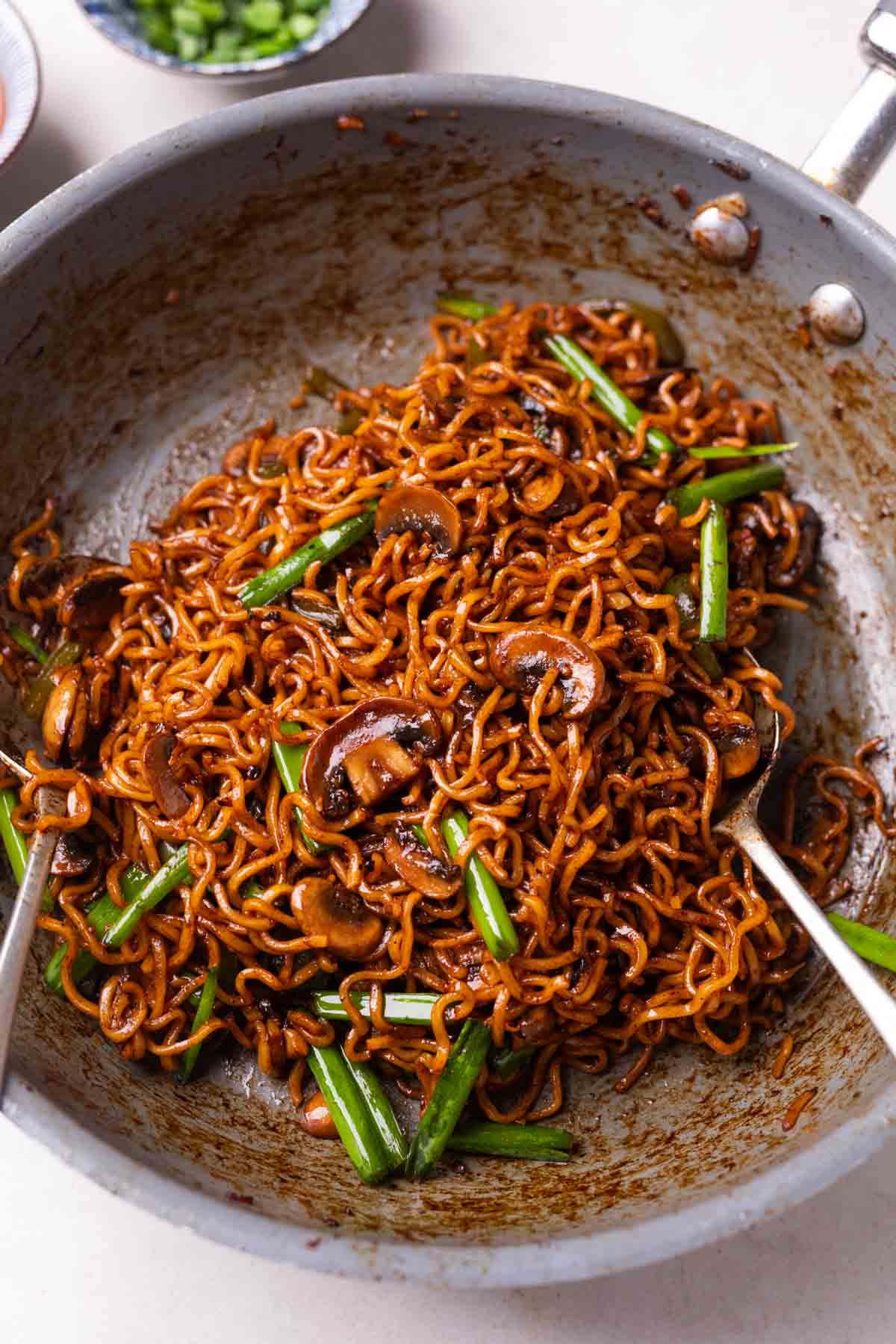 freshly made mushroom ramen noodles still in the pan
