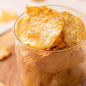 air fryer potato chips in a transparent glass container