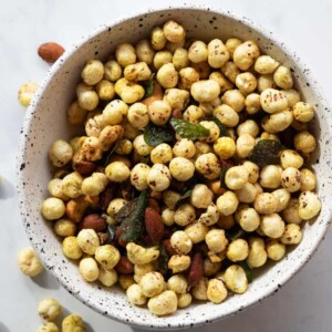Roasted Makhana and Nuts served in a white bowl