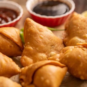 Closeup of a beautiful, perfect golden brown samosa