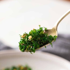 Crispy fried spinach in a spoon