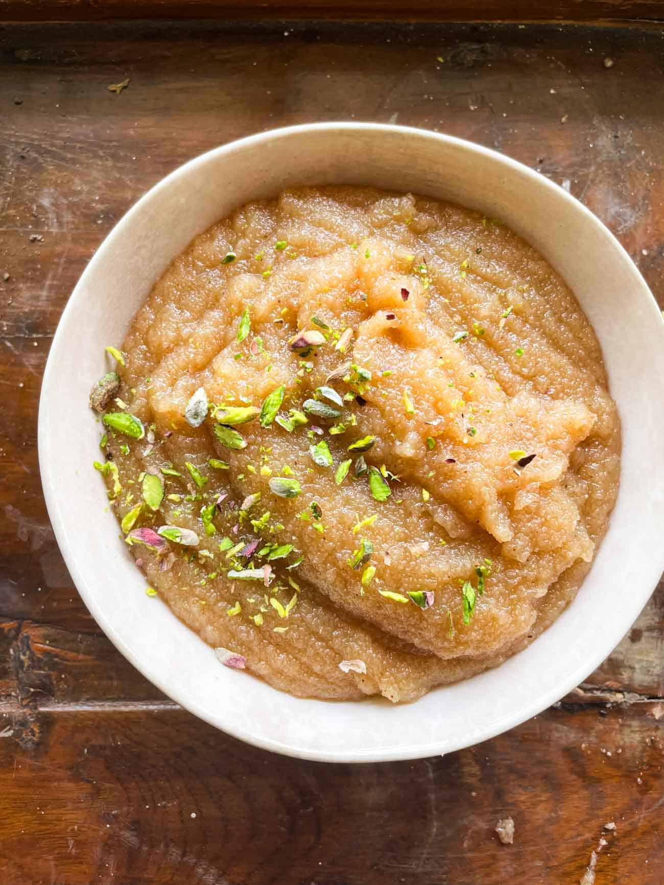 Sooji Halwa topped with sliced pista and served in a bowl