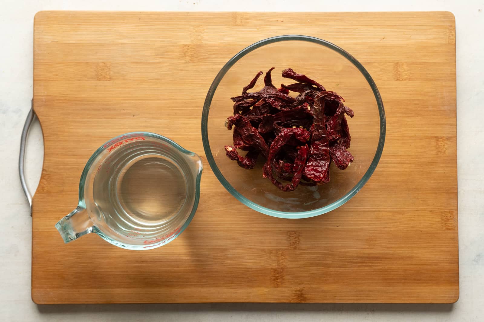Ingredients for schezwan sauce. Pictures here are chillies and water
