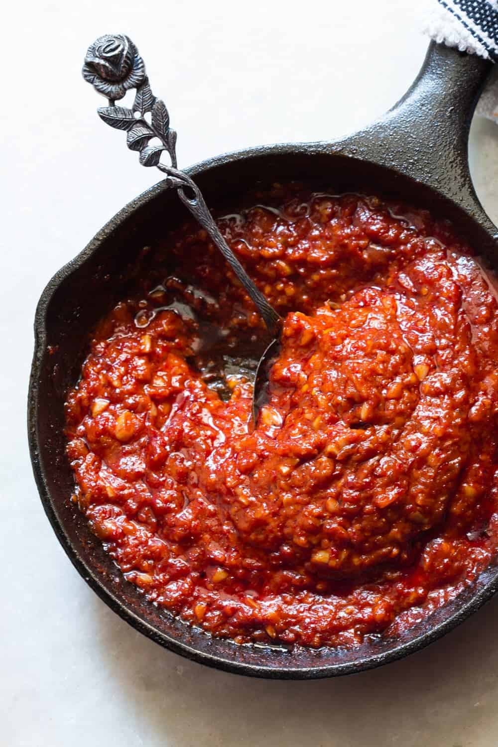 Learn how to make this simple schezwan sauce which is perfect with chicken lollipops, schezwan rice, noodles and manchurian (Step by step video recipe)