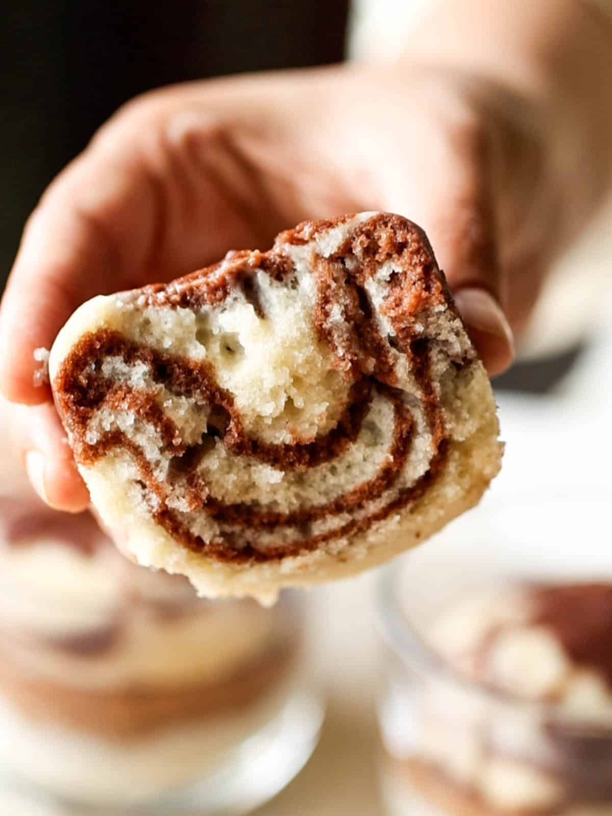 mini eggless marble cake cut open to show the swirls