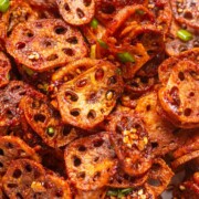 close up image of Korean crispy lotus stem to show it's thin and crispy texture