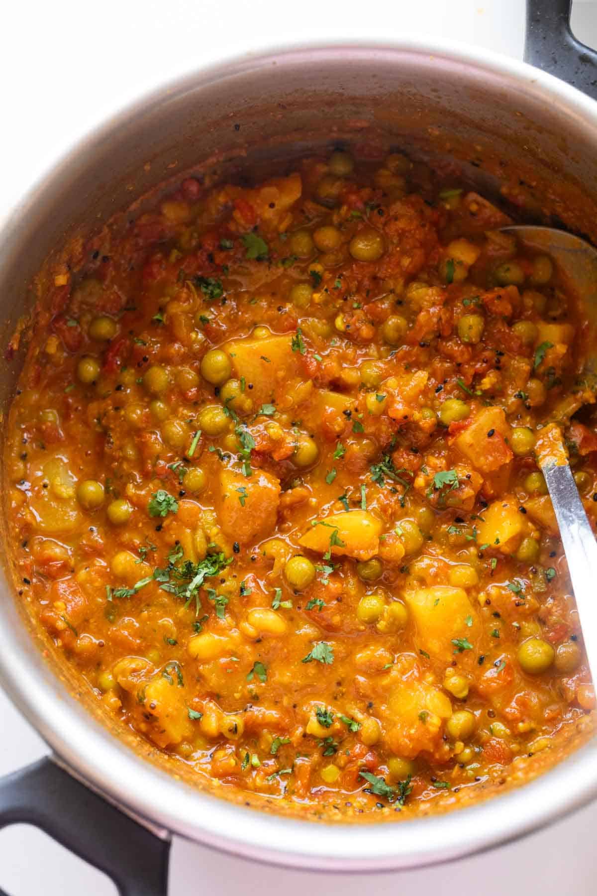 freshly made aloo matar in the pressure cooker