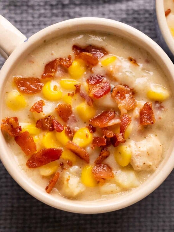 Picture of instant pot chicken potato corn chowder served in a bowl with bacon sprinkled on top