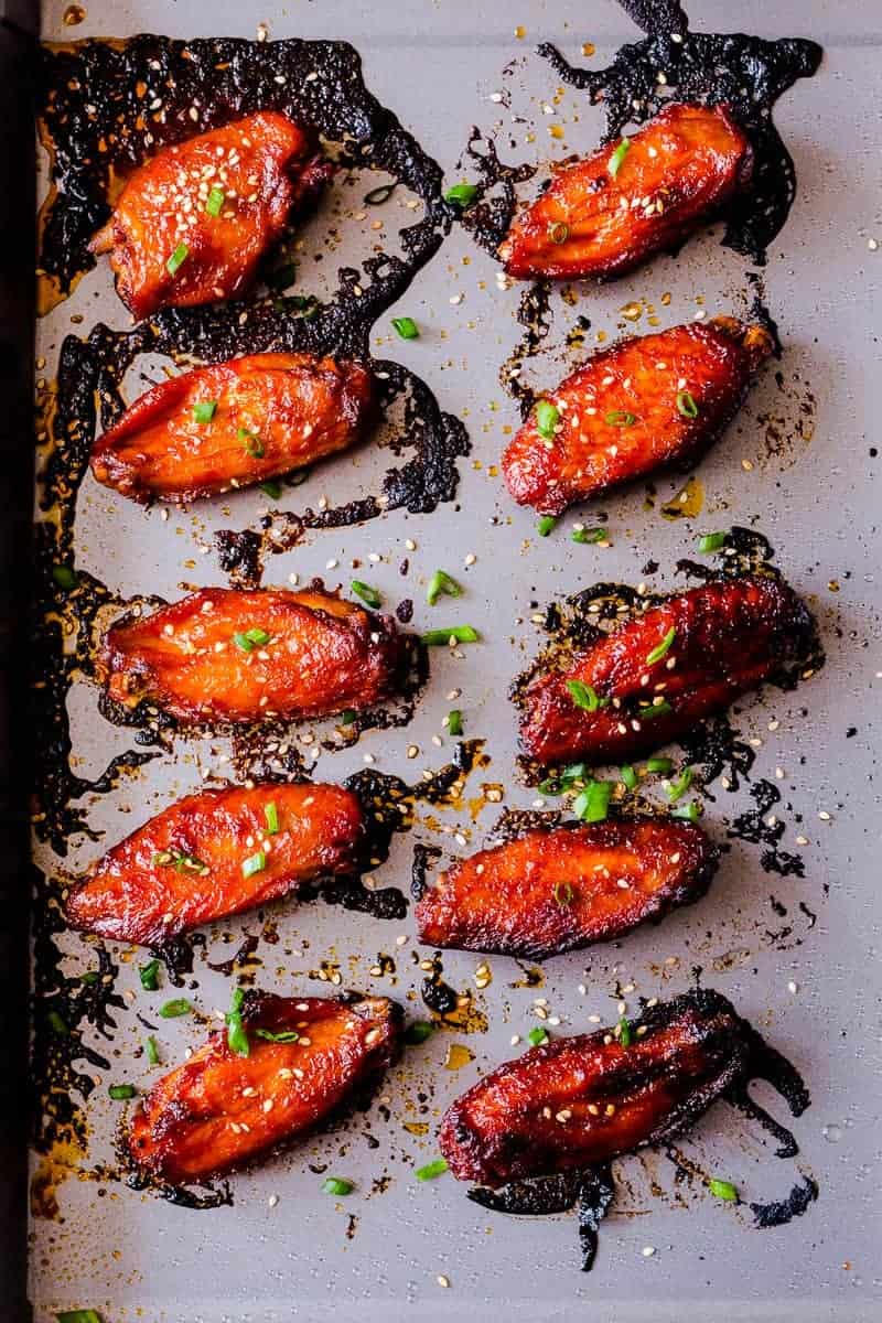Spicy, crispy, full of umami and insanely addictive Korean baked gochujang chicken wings. You'll never go back to having wings any other way!