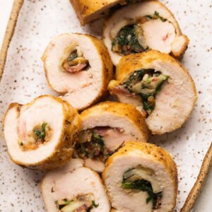 Sliced pieces of Chicken Roulade served on a platter