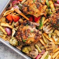 Honey Balsamic Chicken in a sheet pan with veggies.