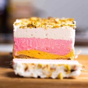 Classic Cassata sliced on a worktop showing all the four layers