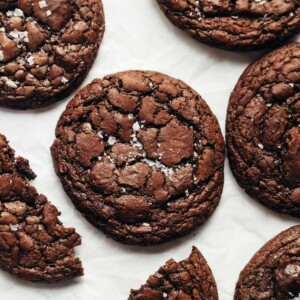 Brownie Cookies sprinkled with sea salt and placed on a tray lined with parchment paper