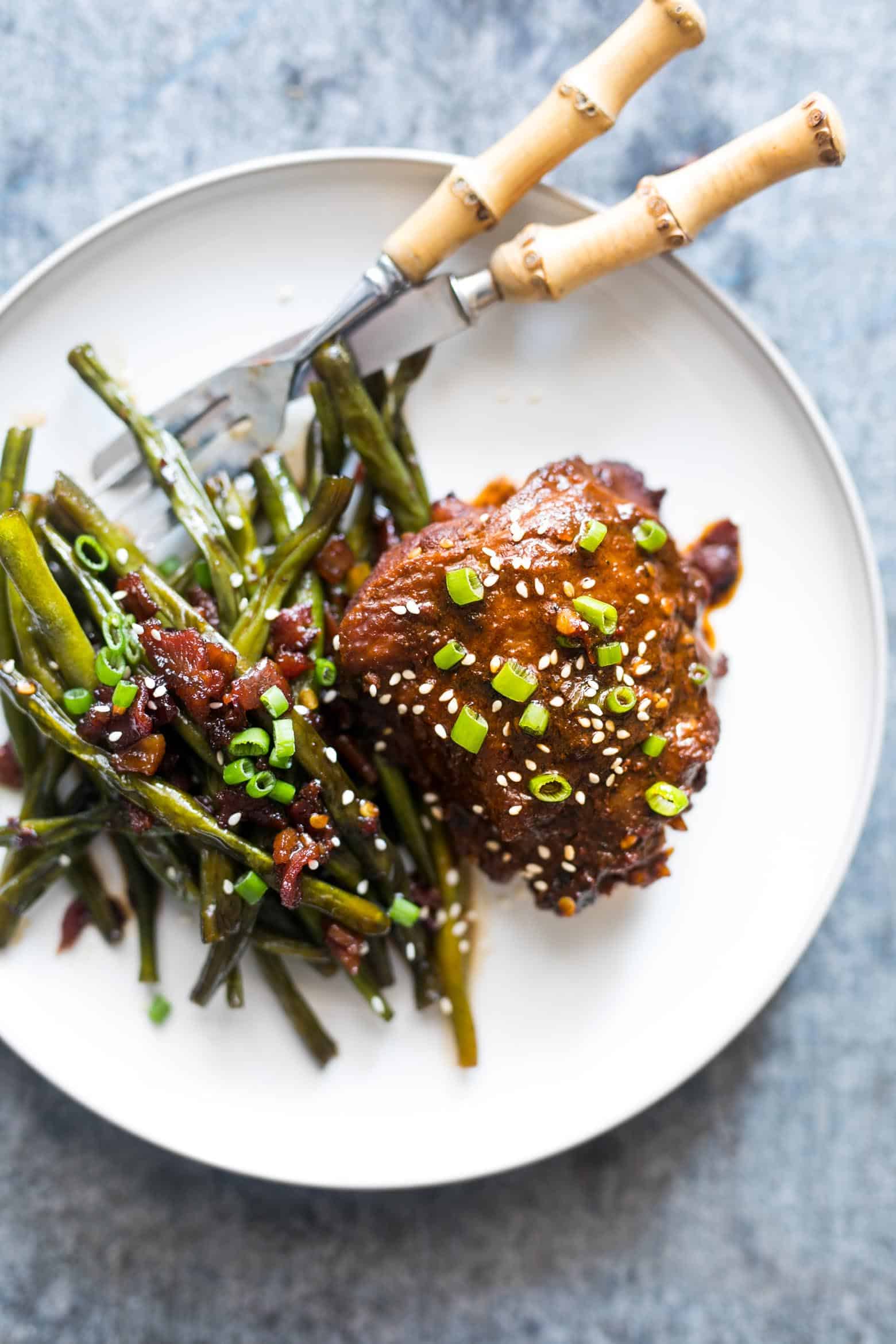 Spicy Korean Chicken Thighs in Gochujang Sauce - an intensely flavoured chicken recipe made in a cast iron pan for extra crispy, juicy thighs and a finger licking marinade!