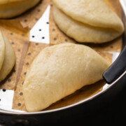 close up image of steamed bao buns to showcase their texture