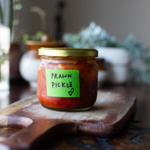 A bottle of prawn pickle labelled in green tape