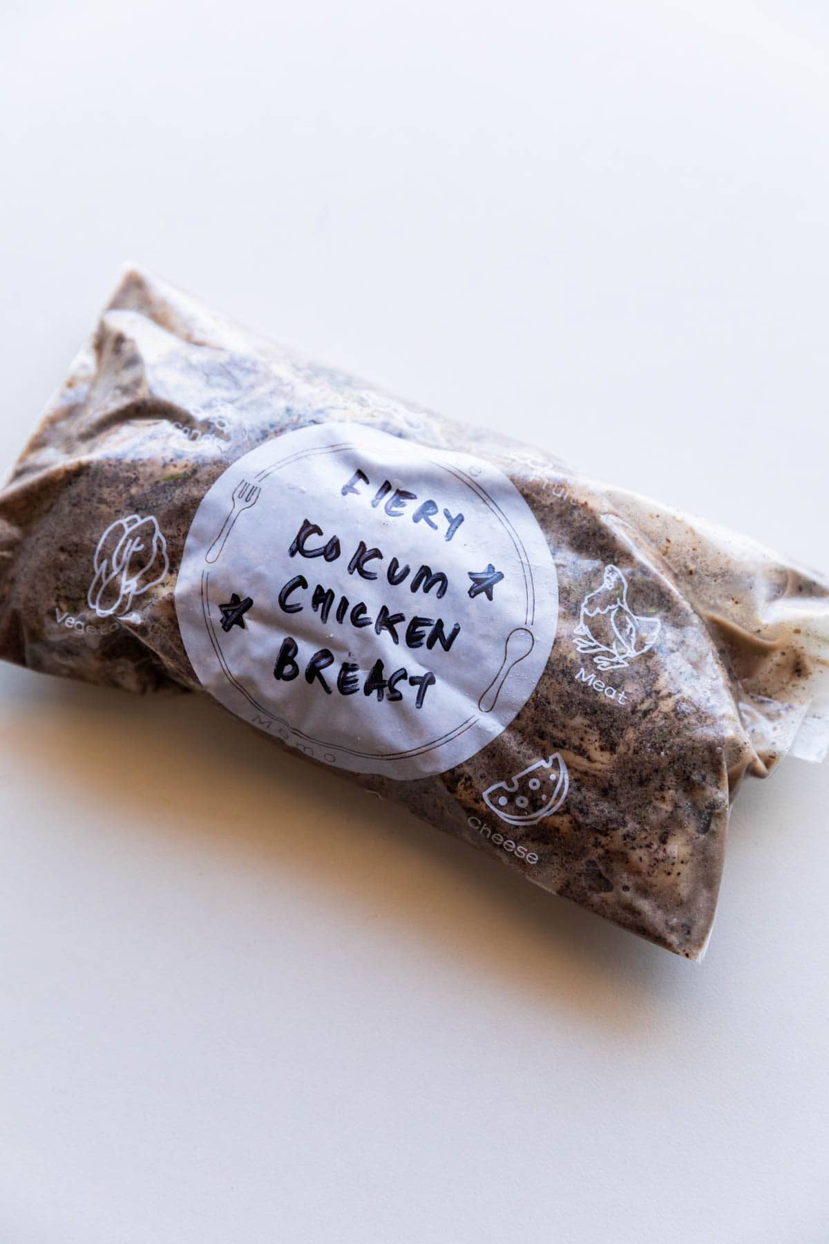 chicken breast marinated in kokum chicken marinade and stored in a labelled zip lock bag