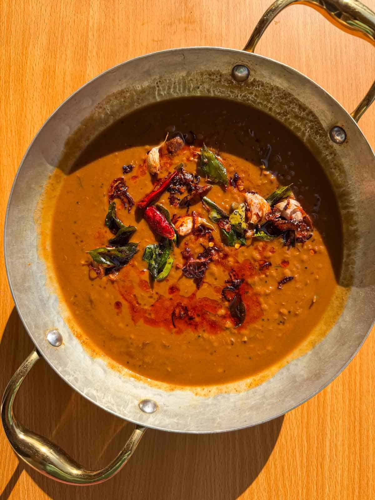 freshly made horsegram dal in a kadai