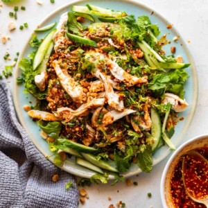 spicy chicken cucumber salad served with chilli oil