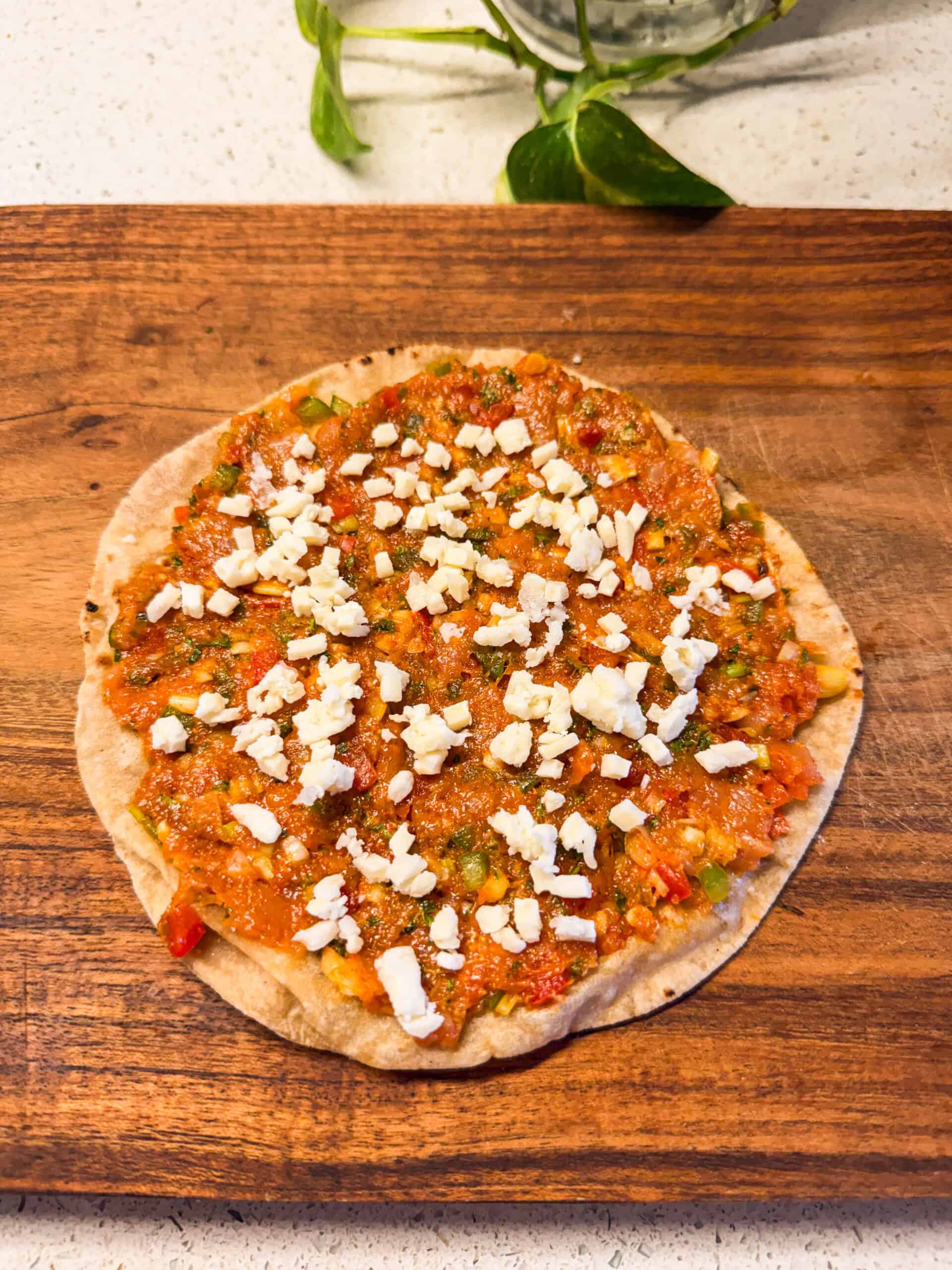 chicken smash taco assembled and ready to be cooked