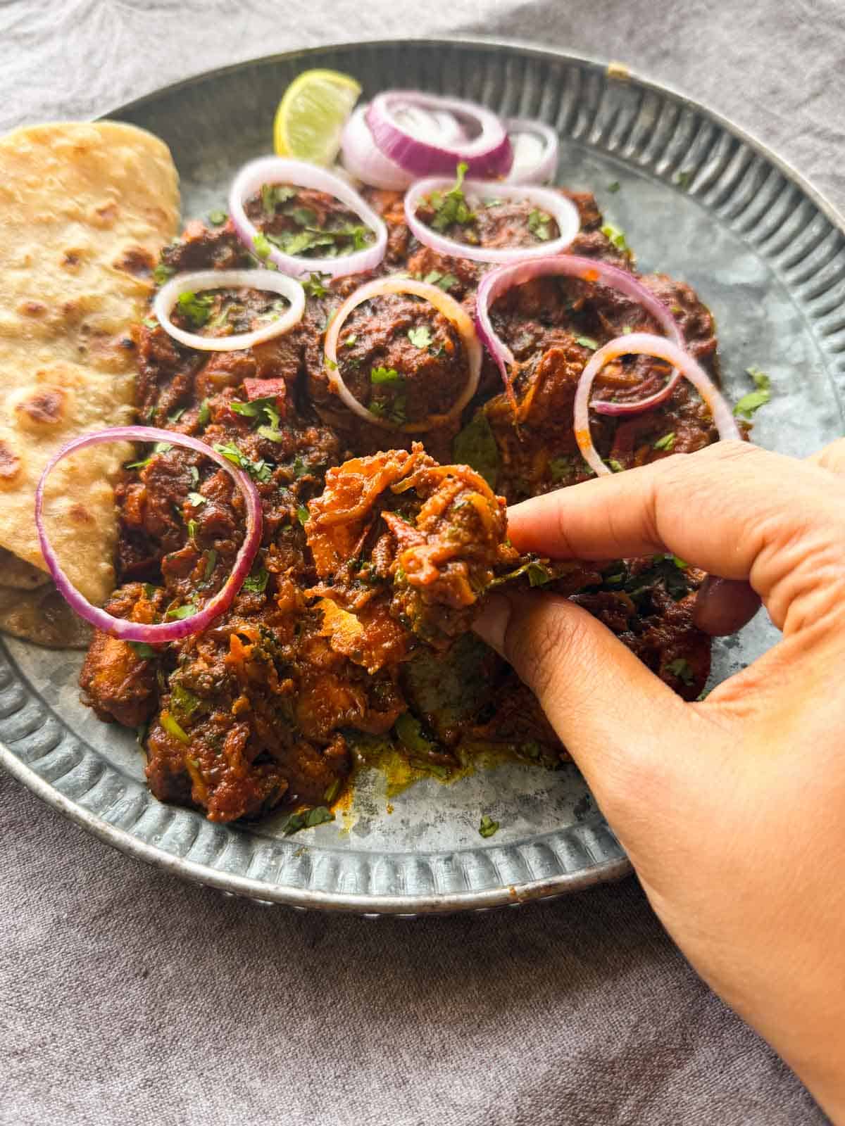 Indian chicken roast served with accompaniments