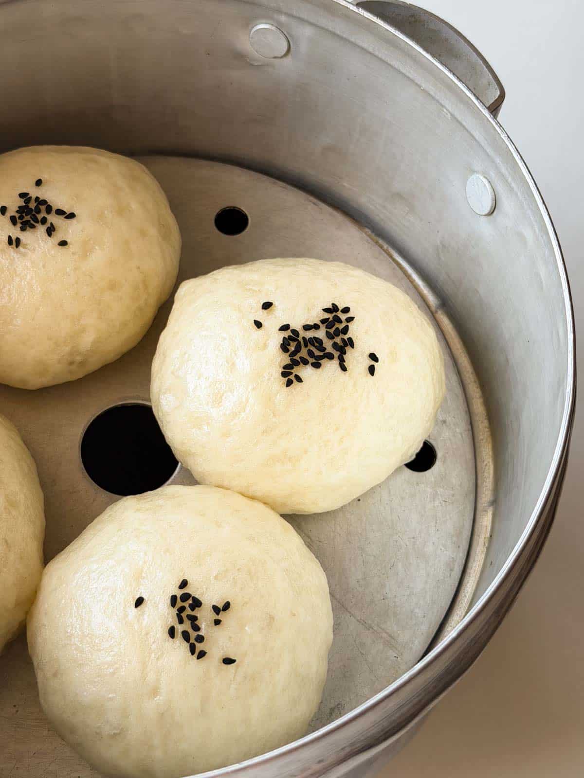 freshly steamed buns or boazi still in the steamer
