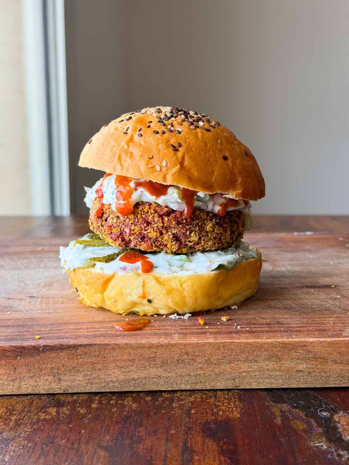 an image of rajma paneer burger assembled and ready for serving