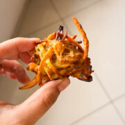 a close up image of air fryer veg pakora to show it's crispy texture