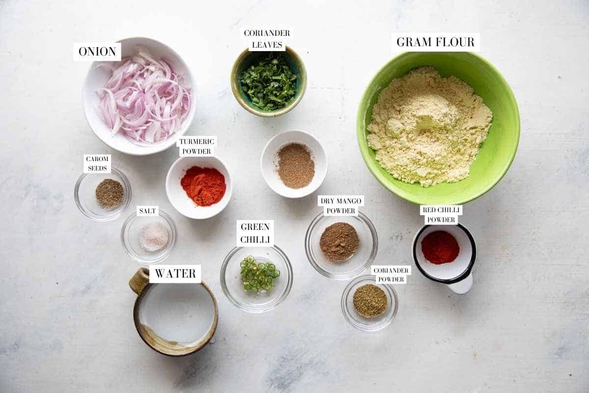 Ingredients to make pakoda of kadhi pakoda with text overlay