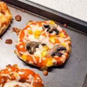 close up image of a mini veg pizza