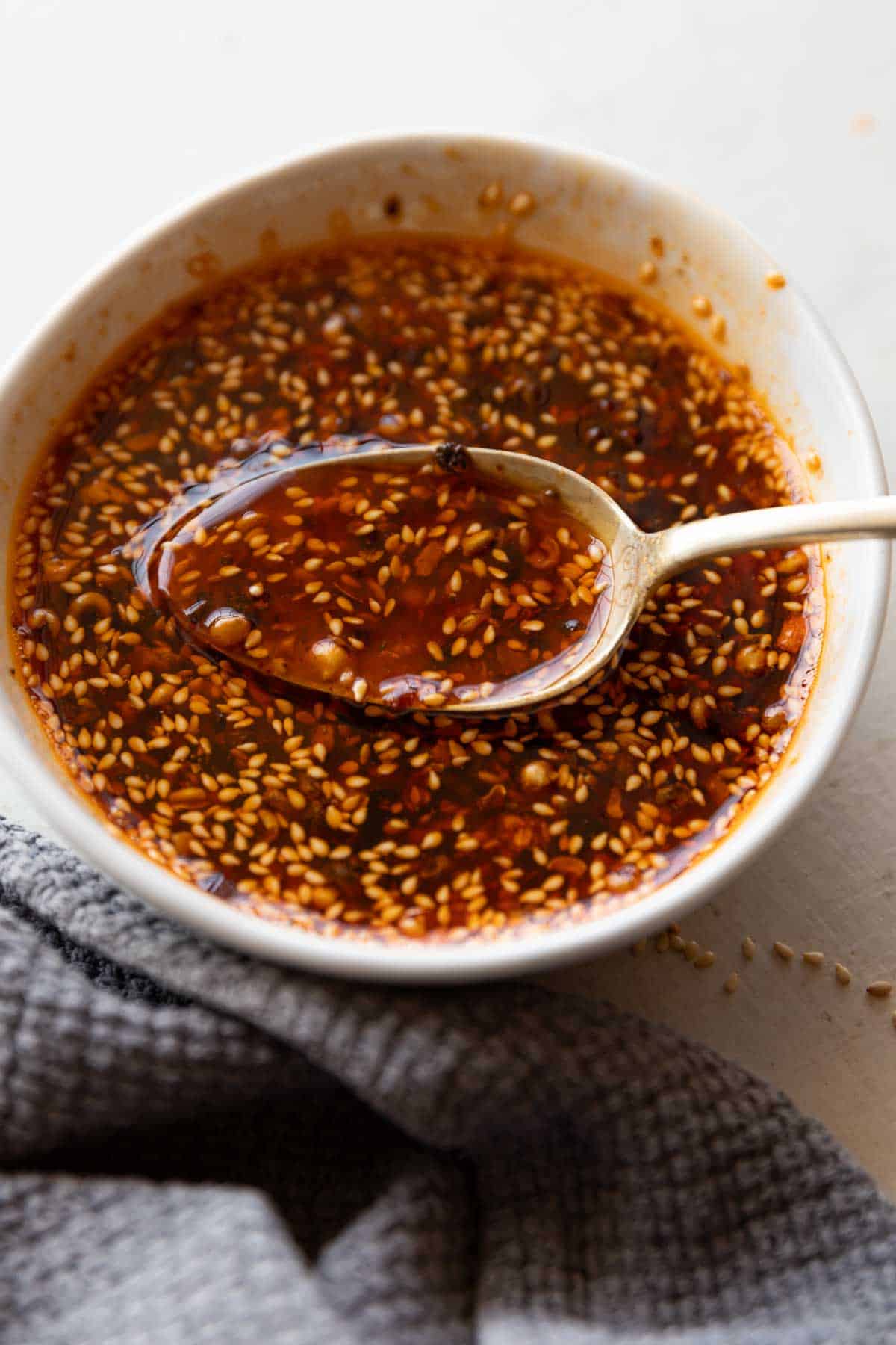 chilli oil in a white bowl with spice