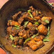 an image of curry leaf chicken in the cooking vessel