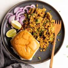 Street style egg bhurji served on a plate with pav