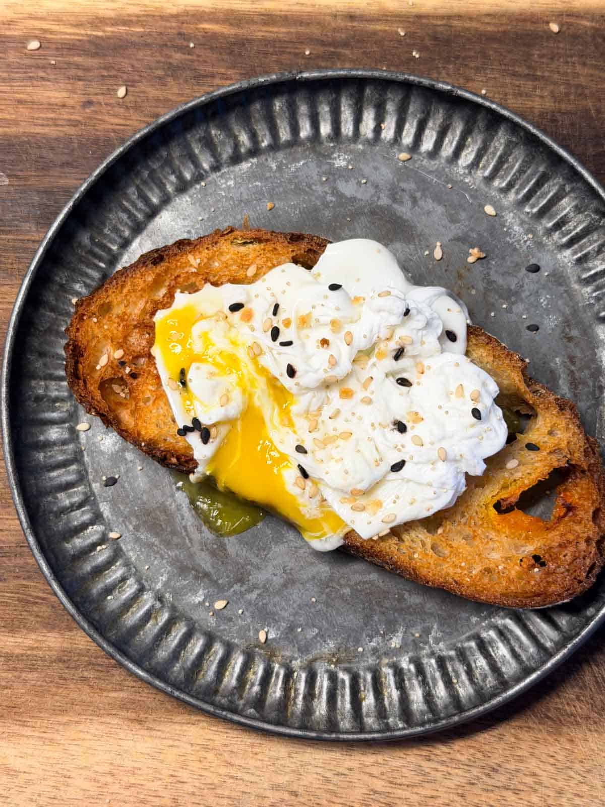 air fryer poached egg served on top of a toast