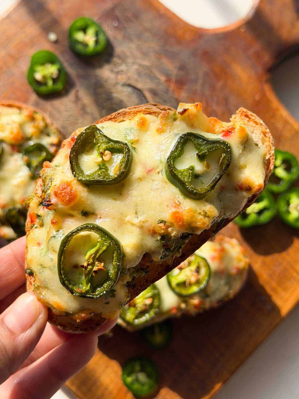 a close up image of jalapeno popper toastie to showcase its color and texture