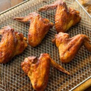 soy chicken wings in the air fryer tray ready to be served