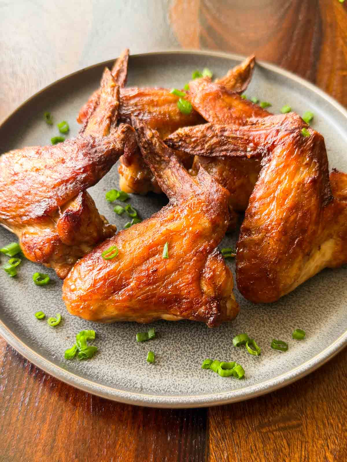 soy chicken wings served on a plate 
