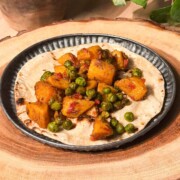 masala aloo matar served on a roti